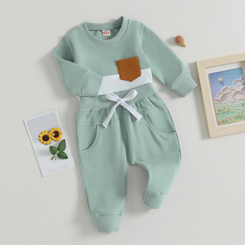 Baby 2-piece winter outfit: mint sweatshirt with orange pocket and matching stretch pants