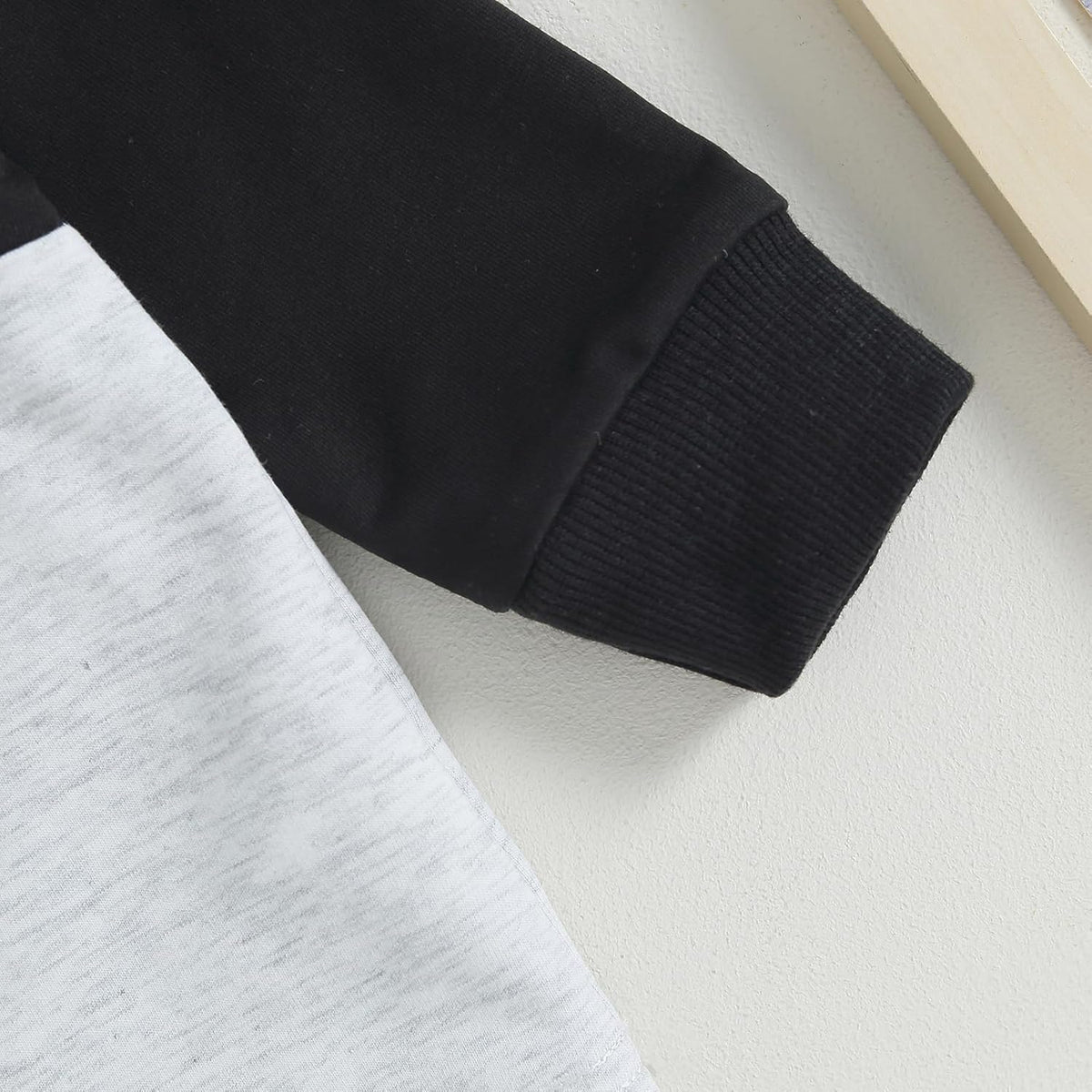 Black ribbed cuff jogger pant leg detail