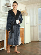 Two-tone hooded fleece robe holding mug, dark gray with black hood lining and belt