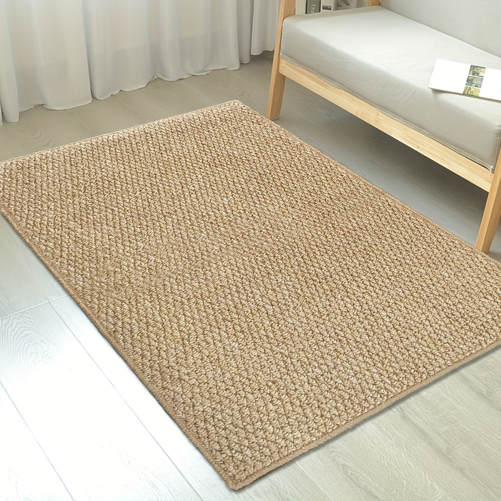 Tan jute-look entry mat with uniform woven pattern and tidy border.