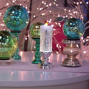 Three glitter LED candle lights on stands, turquoise and silver with flame tops