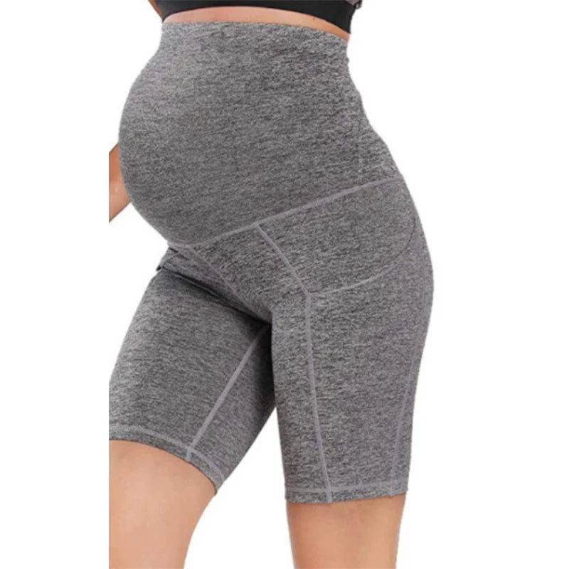 Dark gray maternity bike-length leggings with high waist panel and stitched seams