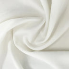 White knit sweater fabric with soft draped texture.