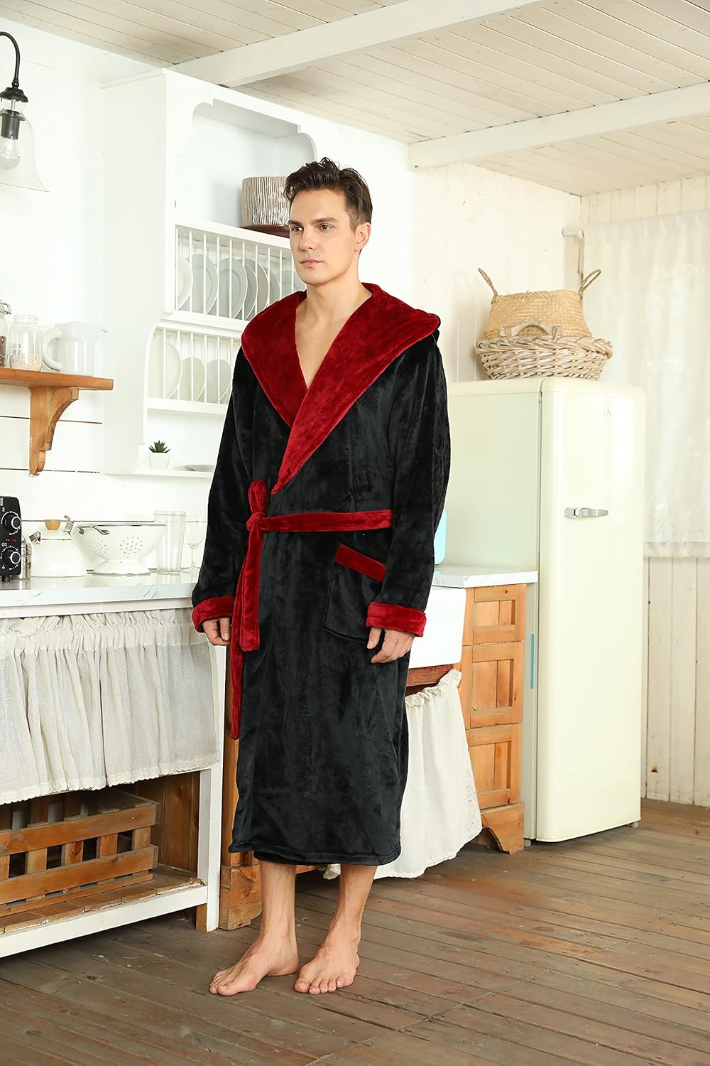 Two-tone hooded fleece robe front view, dark fabric with red trim, belt and pockets