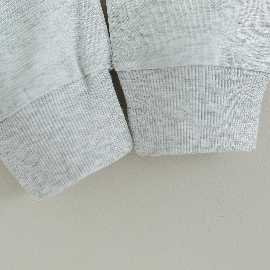 Light gray sweatshirt sleeves with ribbed cuffs