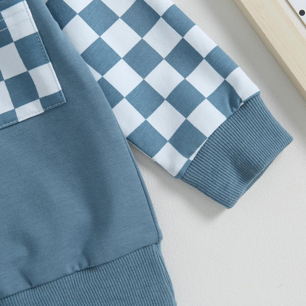 Blue sweatshirt with white-and-blue checkered sleeve cuff and ribbed hem