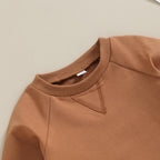 Brown baby sweatshirt with ribbed neckline and panel seam detail