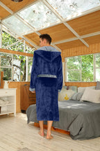 Men's two-tone blue fleece bathrobe with hood and wrap belt, back view