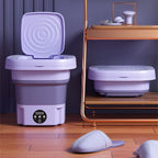 Purple collapsible washing bucket with open lid and control panel