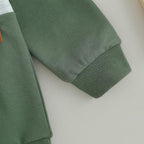 Green sweatshirt sleeve with ribbed knit cuff