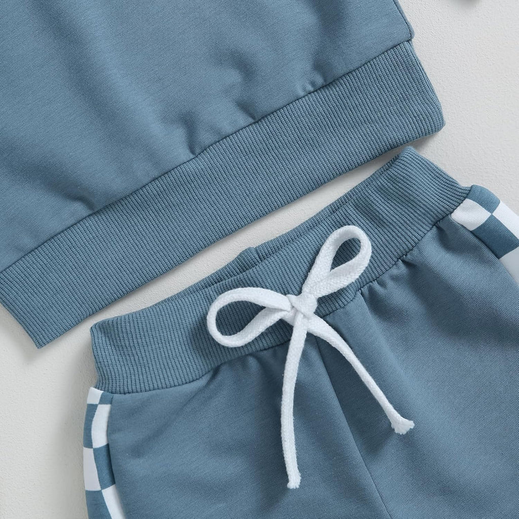 Powder blue jogger pants with white drawstring and striped side panel