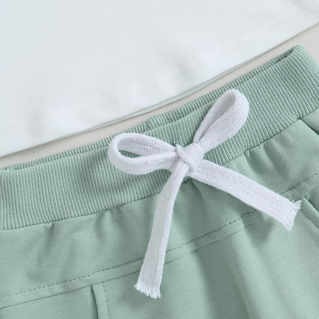 Mint jogger pants with ribbed waistband and white drawstring bow