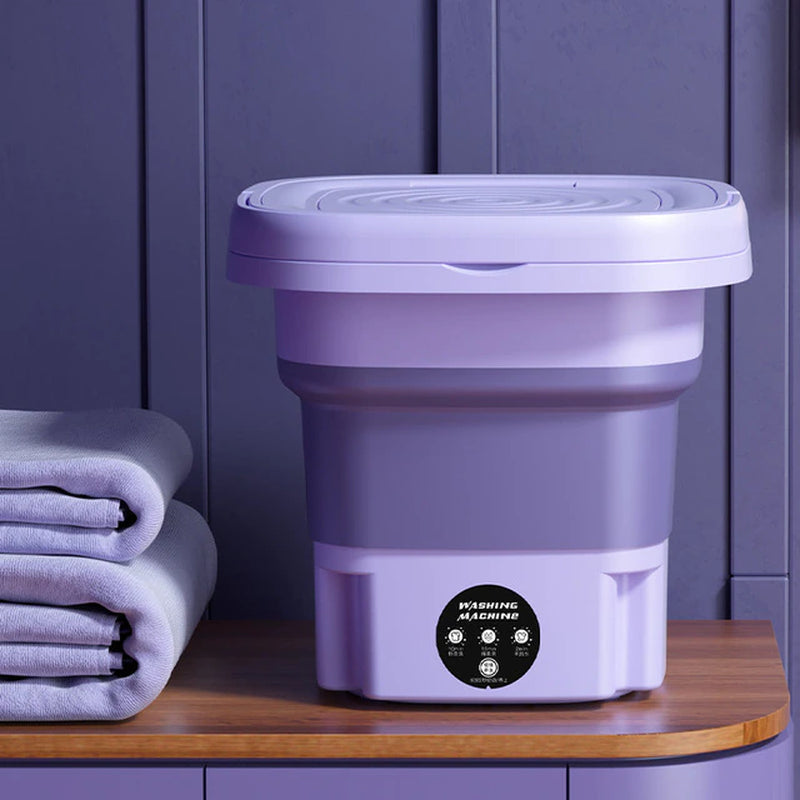 Purple collapsible washing bucket with closed lid and front control dial