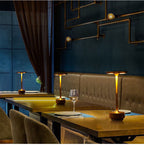 Set of cordless LED table lamps with bronze frames and warm glowing round top shades