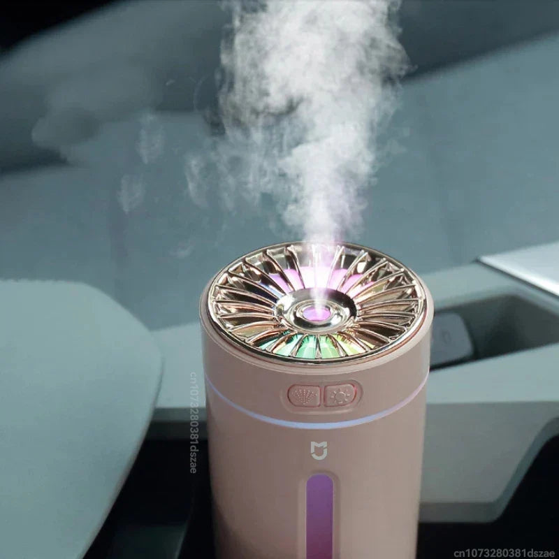 USB humidifier column aroma diffuser, pink with glowing top ring, emits mist