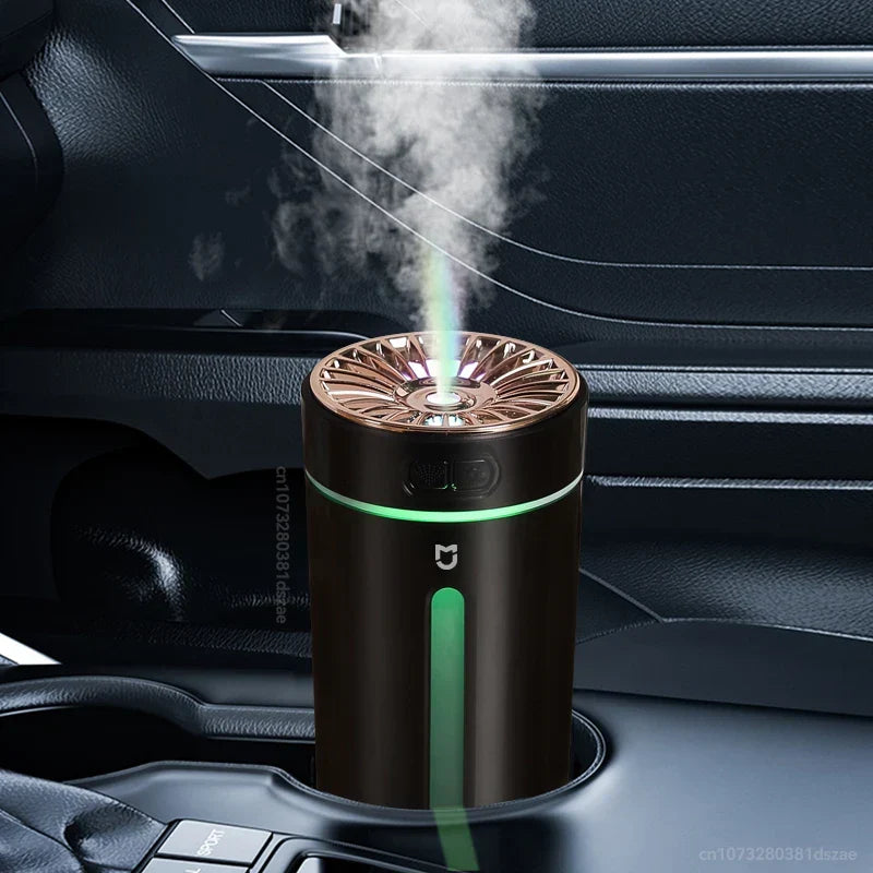 USB humidifier column aroma diffuser, black body with green indicator, emits cool mist