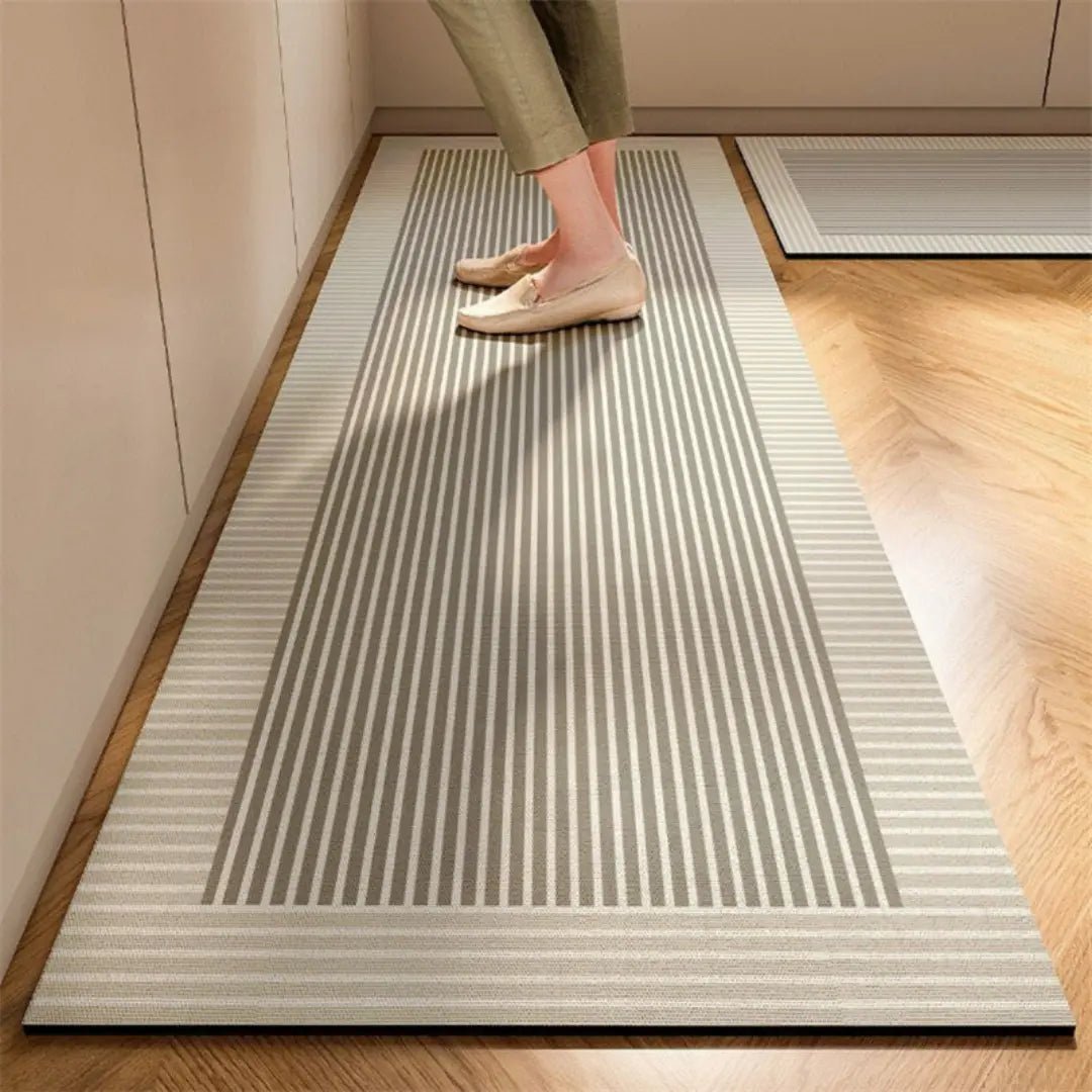 Beige and gray kitchen runner rug with vertical stripe pattern and non-slip backing.