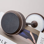 Wireless table lamp head with dark circular LED grille and metal rim