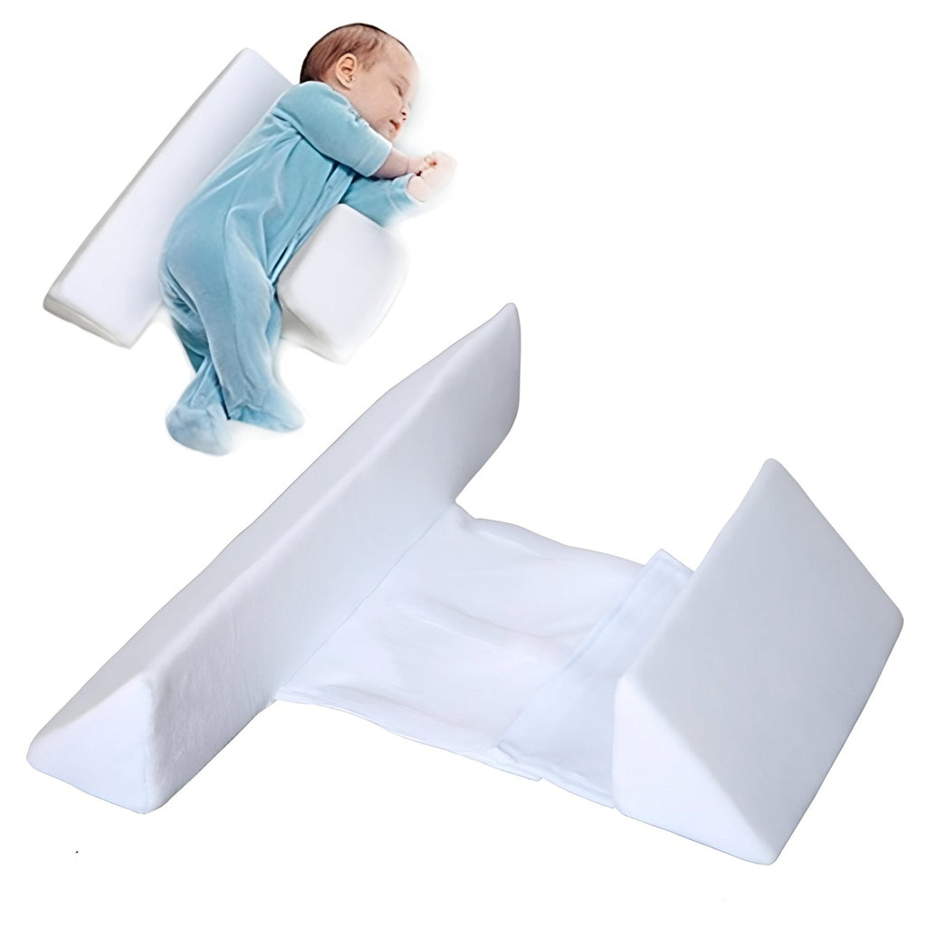 White baby side positioner with anti-roll bolsters, baby posed for side support