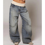 Light blue baggy wide-leg jeans with contrast seam panels and ribbed comfort waistband