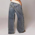 Light blue denim wide-leg jeans with contrast-stitched side panels and back pockets