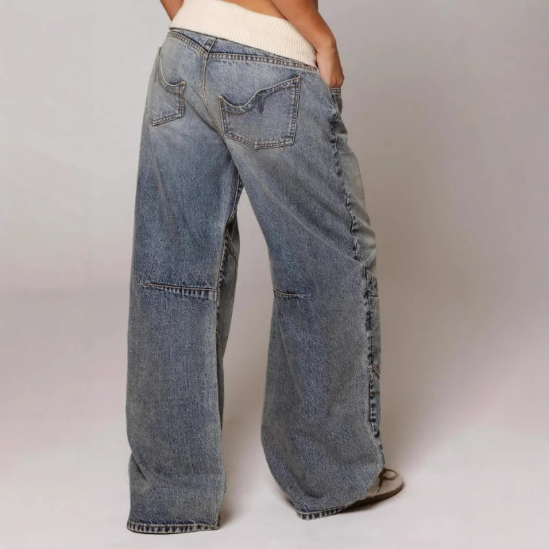 Light blue denim wide-leg jeans with contrast-stitched side panels and back pockets