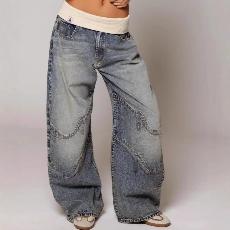 Light blue baggy wide-leg jeans with ribbed waistband and contrast seam panels