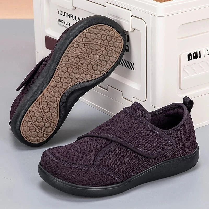 Dark purple slip-on comfort walking shoes with textured knit upper and rubber sole