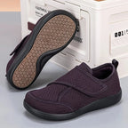 Dark purple slip-on comfort walking shoes with textured knit upper and rubber sole