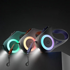Light-up dog leash set with teal, orange, and purple LED rings and carabiner clip ends