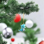 Blue cartoon dragon keychain pendant hanging from Christmas tree branch