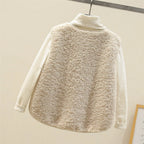 Women’s cream textured sleeveless vest with matching ribbed turtleneck-style sleeves