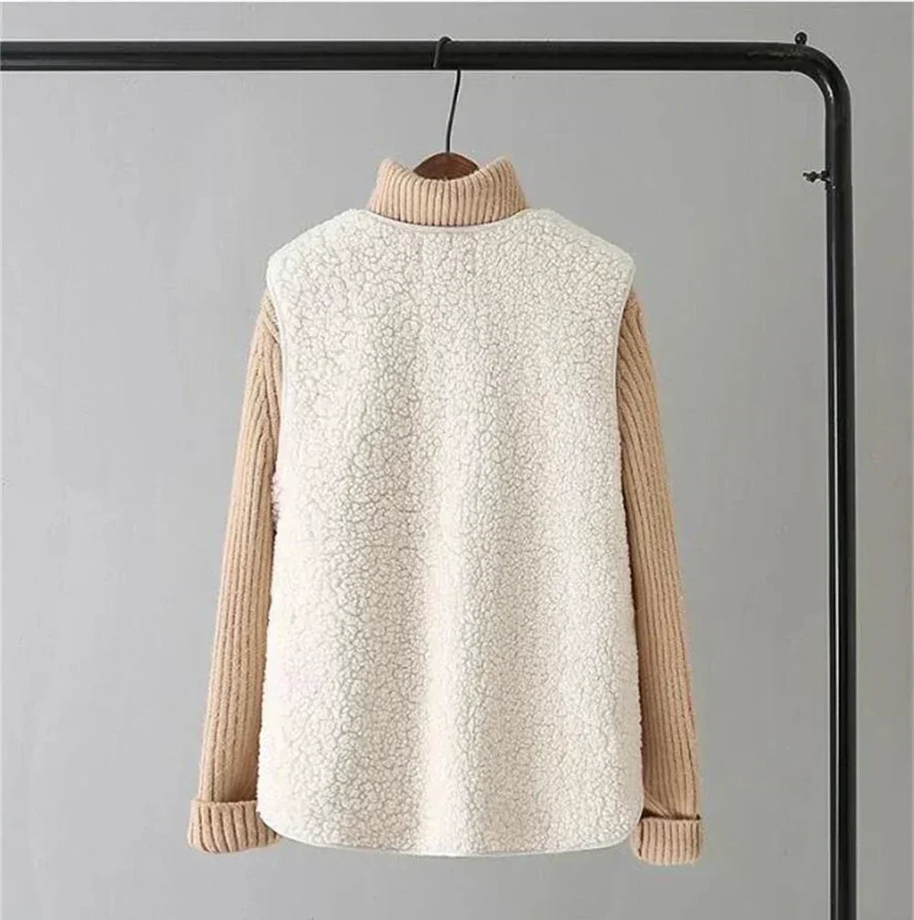 Women’s sleeveless textured vest with cream turtleneck-style knit sleeves in beige