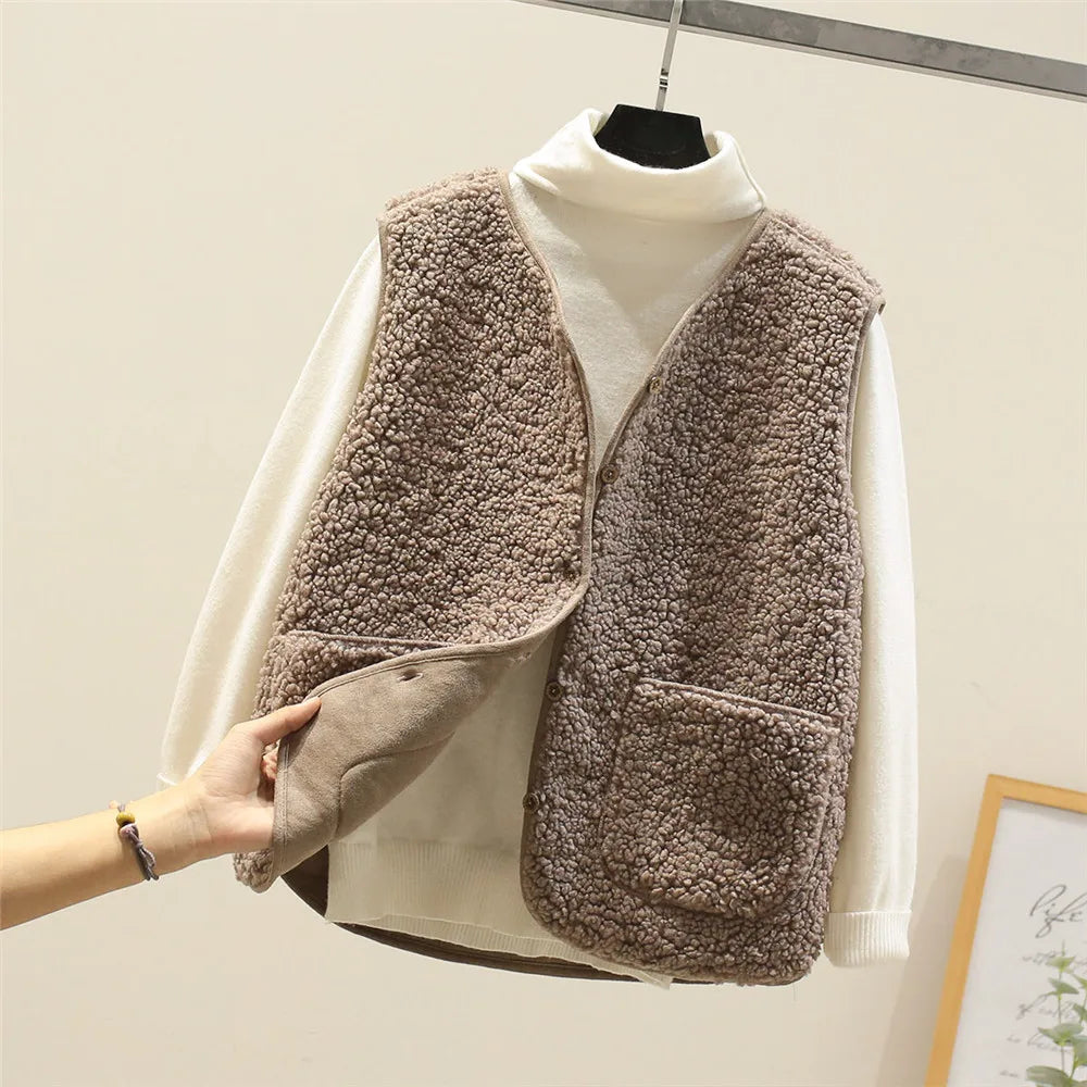 Brown sherpa-textured sweater vest layered over cream turtleneck long-sleeve top set