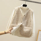 Women’s layered knit set with cream textured sleeveless vest over white long-sleeve top