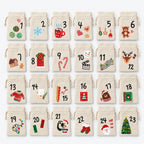 Set of 24 numbered canvas drawstring advent bags with festive icon prints