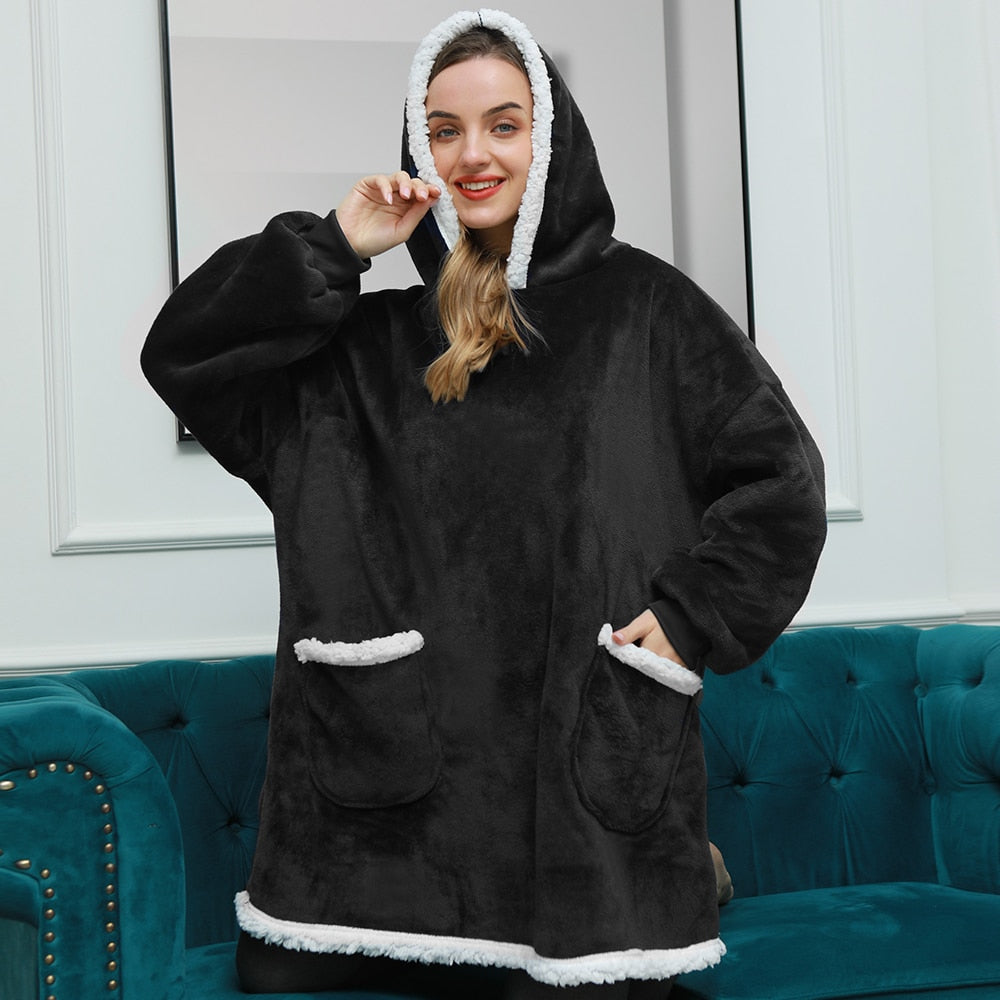 Black wearable blanket hoodie with hood and kangaroo pocket, white sherpa trim hem