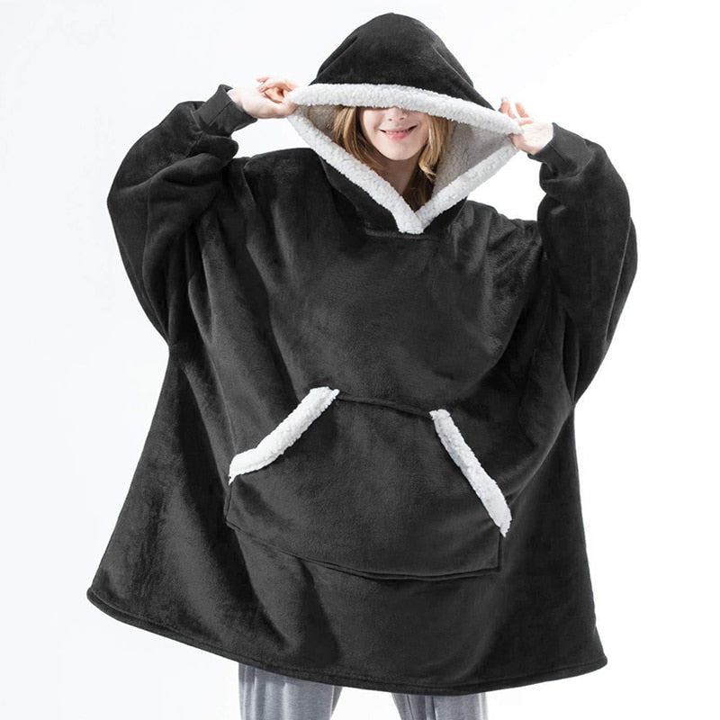 Black oversized wearable blanket hoodie with sherpa-lined hood and kangaroo pocket