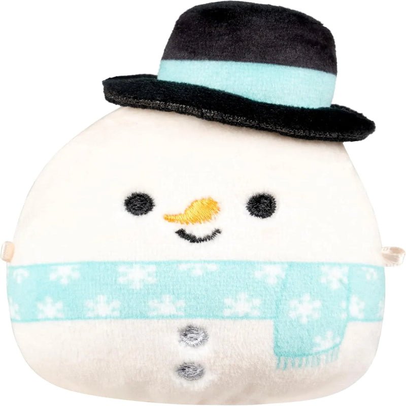 Mini marshmallow-style plush collectible figure with black hat and snowflake sweater