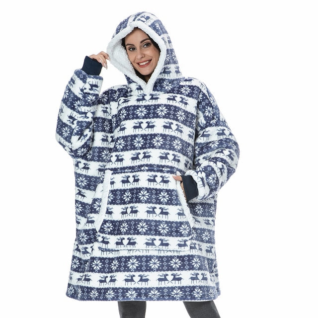 Oversized fleece hoodie blanket with hood and kangaroo pocket, navy reindeer pattern