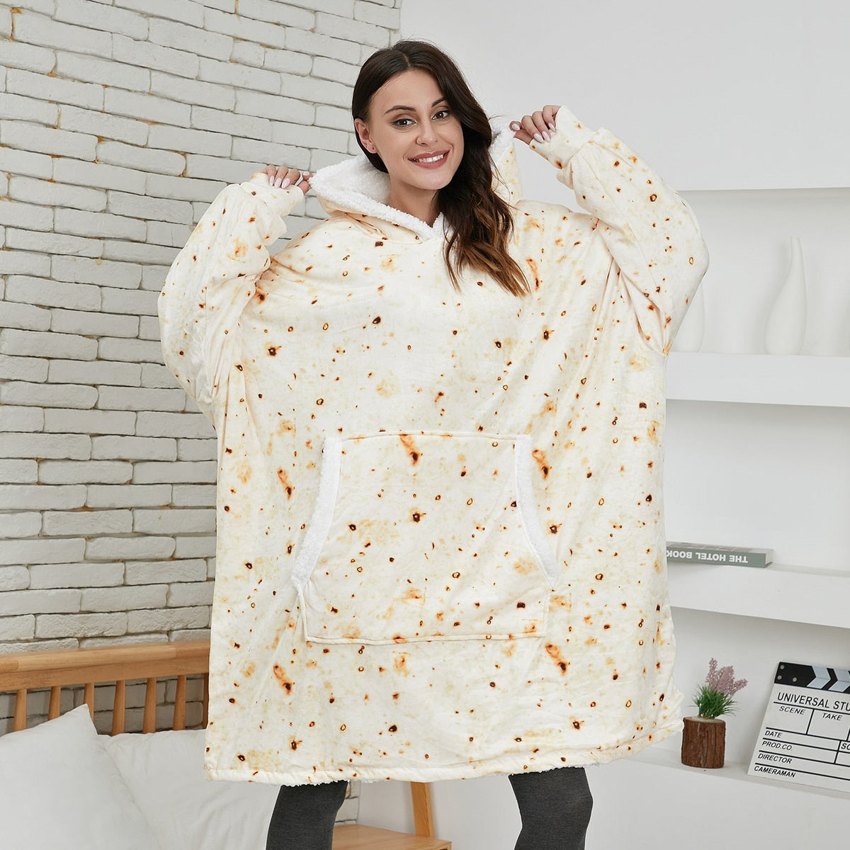Oversized fleece hoodie blanket with hood and kangaroo pocket, white with orange speckles