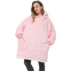 Pink oversized wearable blanket hoodie with hood and kangaroo pocket, sherpa trim