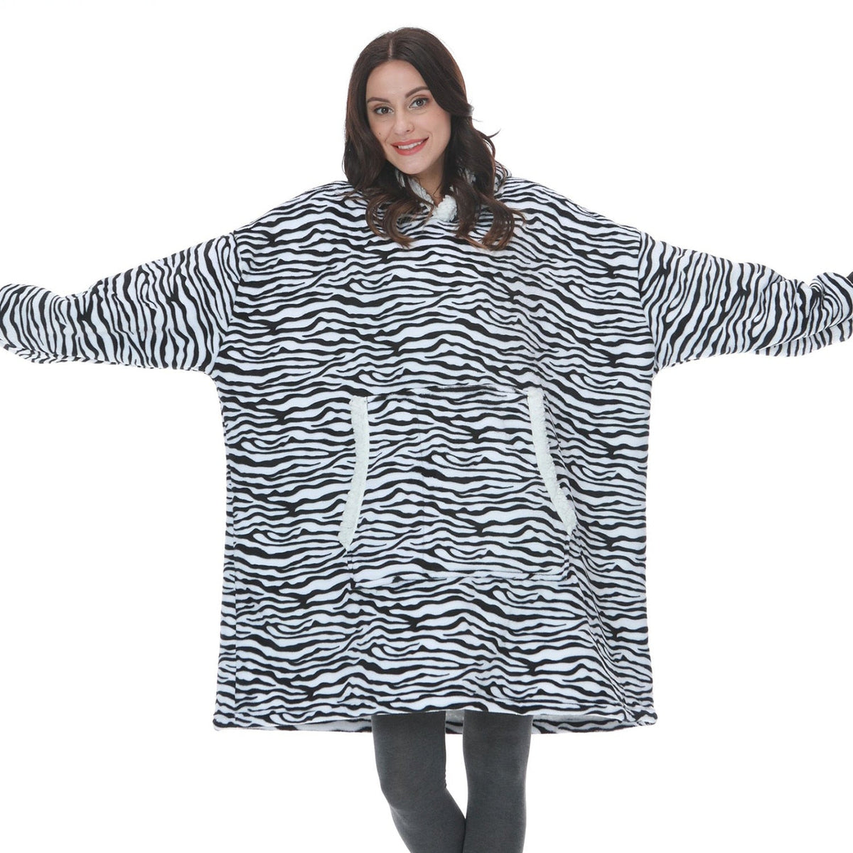 Oversized zebra stripe fleece wearable blanket hoodie with hood and kangaroo pocket.