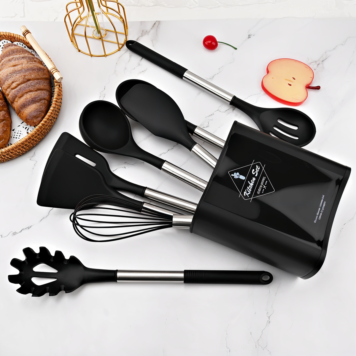 Black silicone kitchen utensil set with black canister, stainless handles, spatulas and whisk