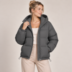 Women's black hooded puffer jacket, full-zip front, quilted insulated outerwear