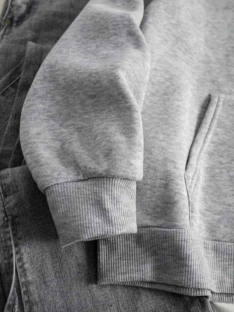 Women's grey hoodie sleeve and ribbed cuff detail, long sleeves