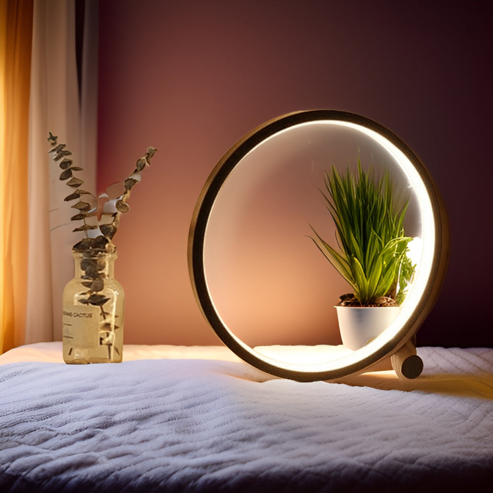 Minimalist round LED table lamp with touch control, glowing halo ring, dark base