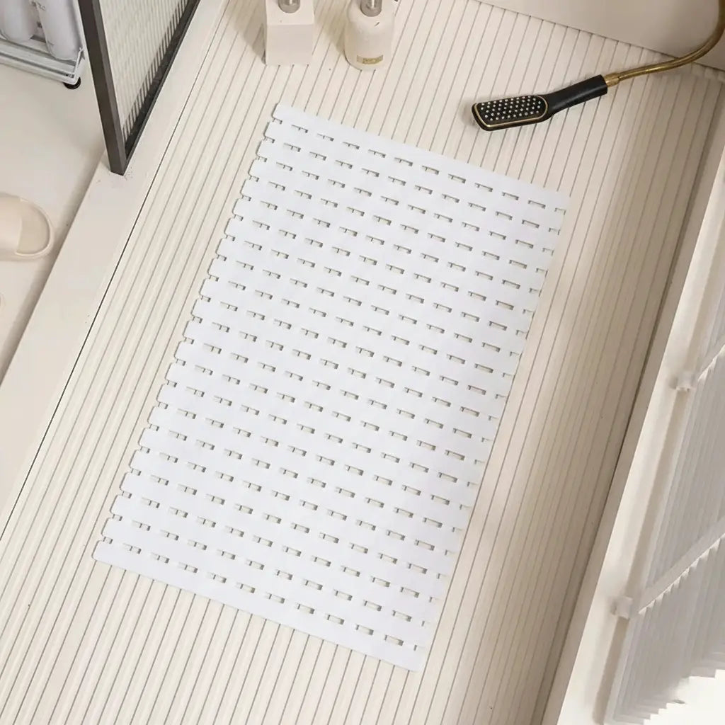 White non-slip bath mat with ridged drainage holes, rectangular for shower and tub floors