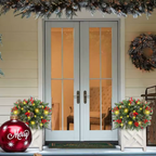 Lighted pine wreath planter insert with red berries and warm yellow LEDs on a white stand