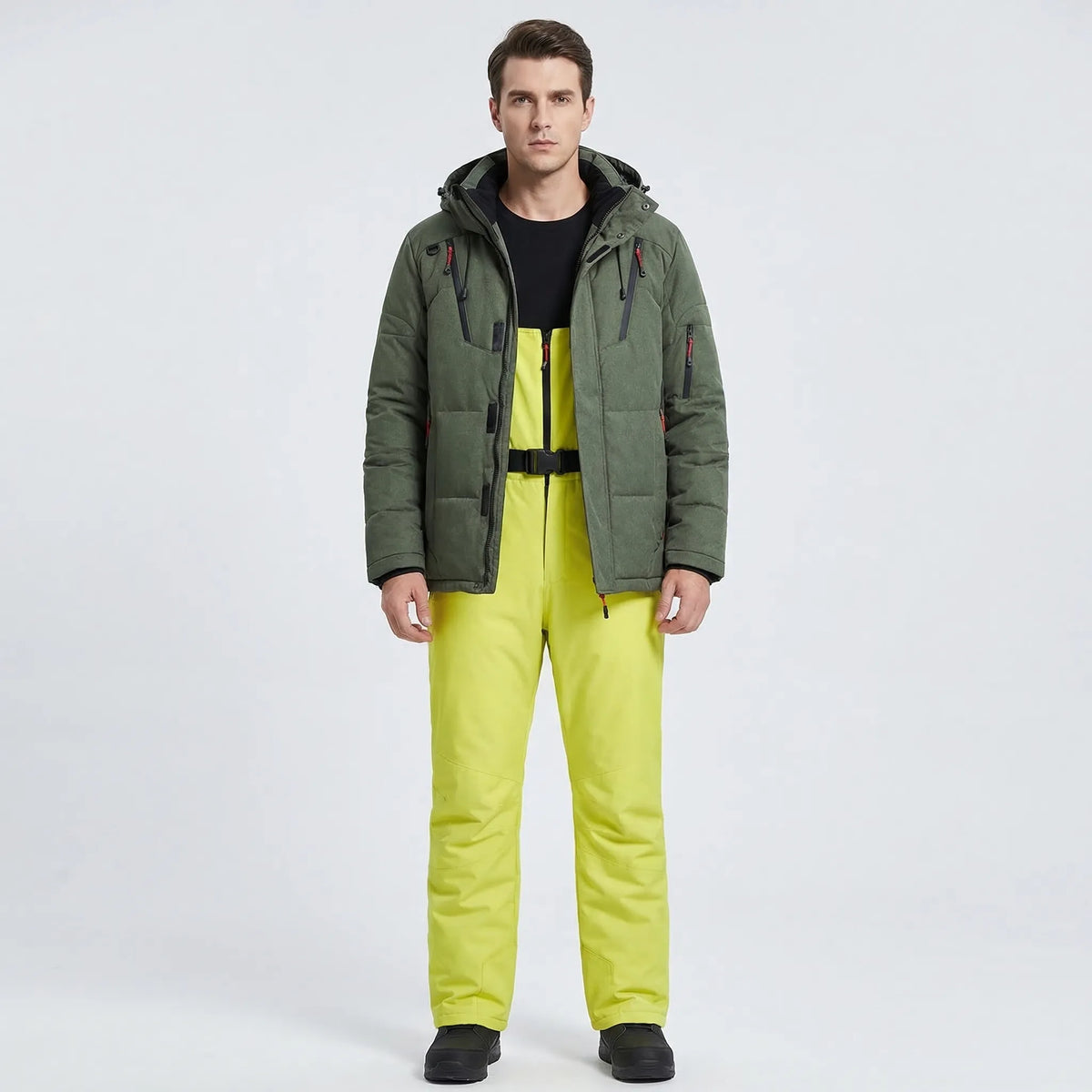 Padded ski jacket and snow pants set with dark green jacket and neon yellow pants, hooded.